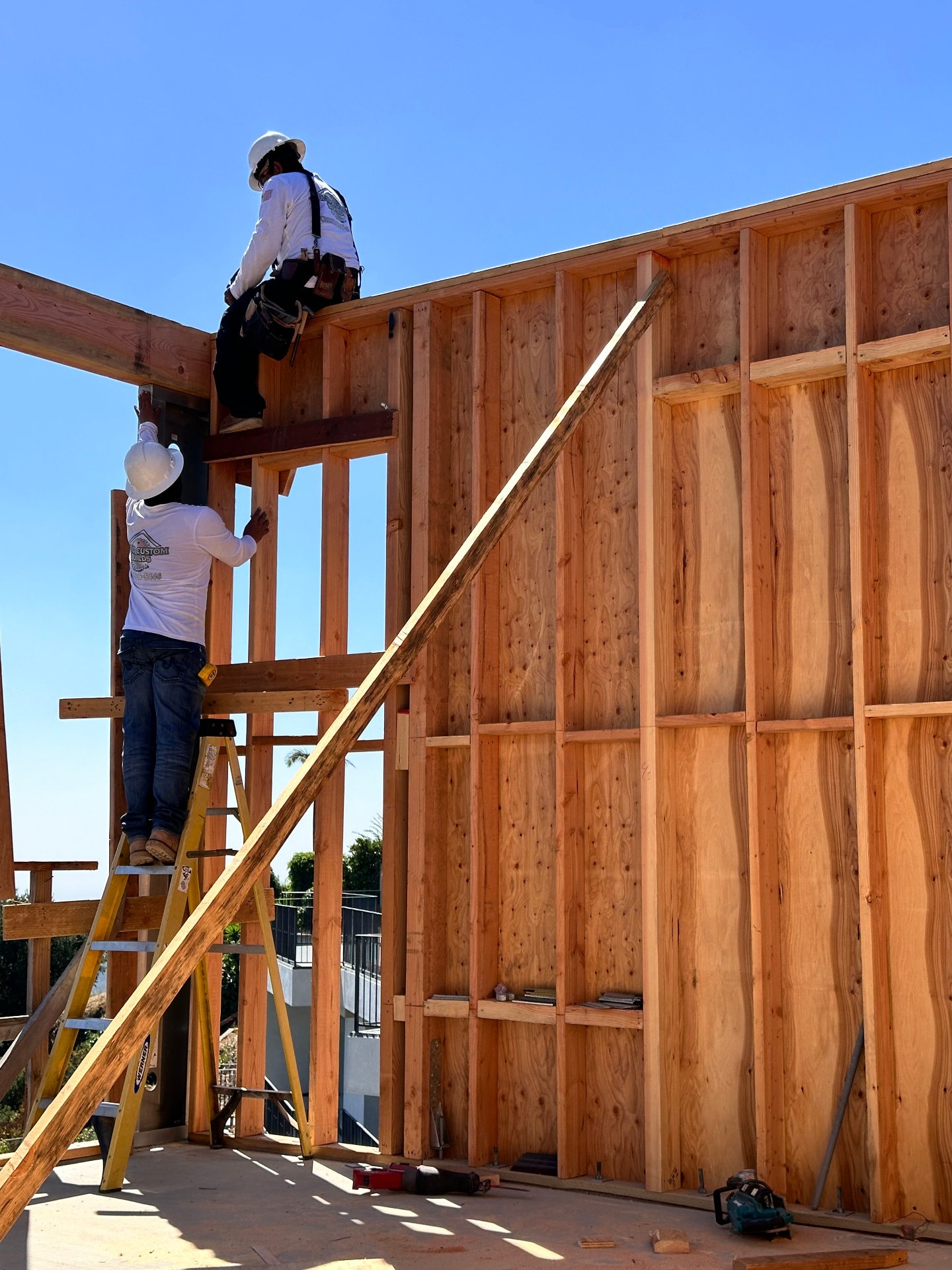 Solid Custom Builds crew framing a wall on a Los Angeles jobsite